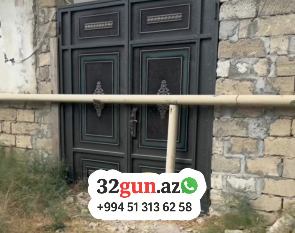 Qapının ortasından keçən qaz borusu sosial şəbəkələrdə gündəm oldu